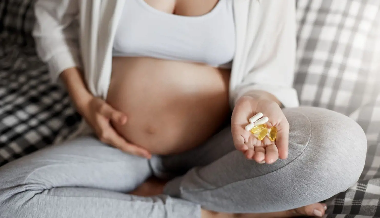 Young Mother Holding Pills1395 (1)